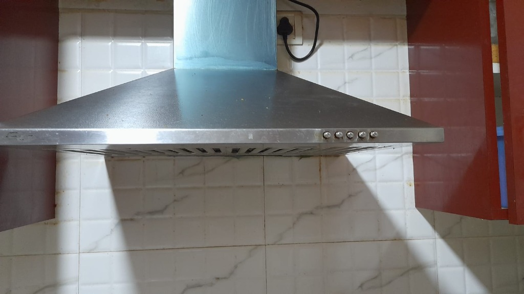 Premium wall-mounted stainless steel kitchen chimney installation